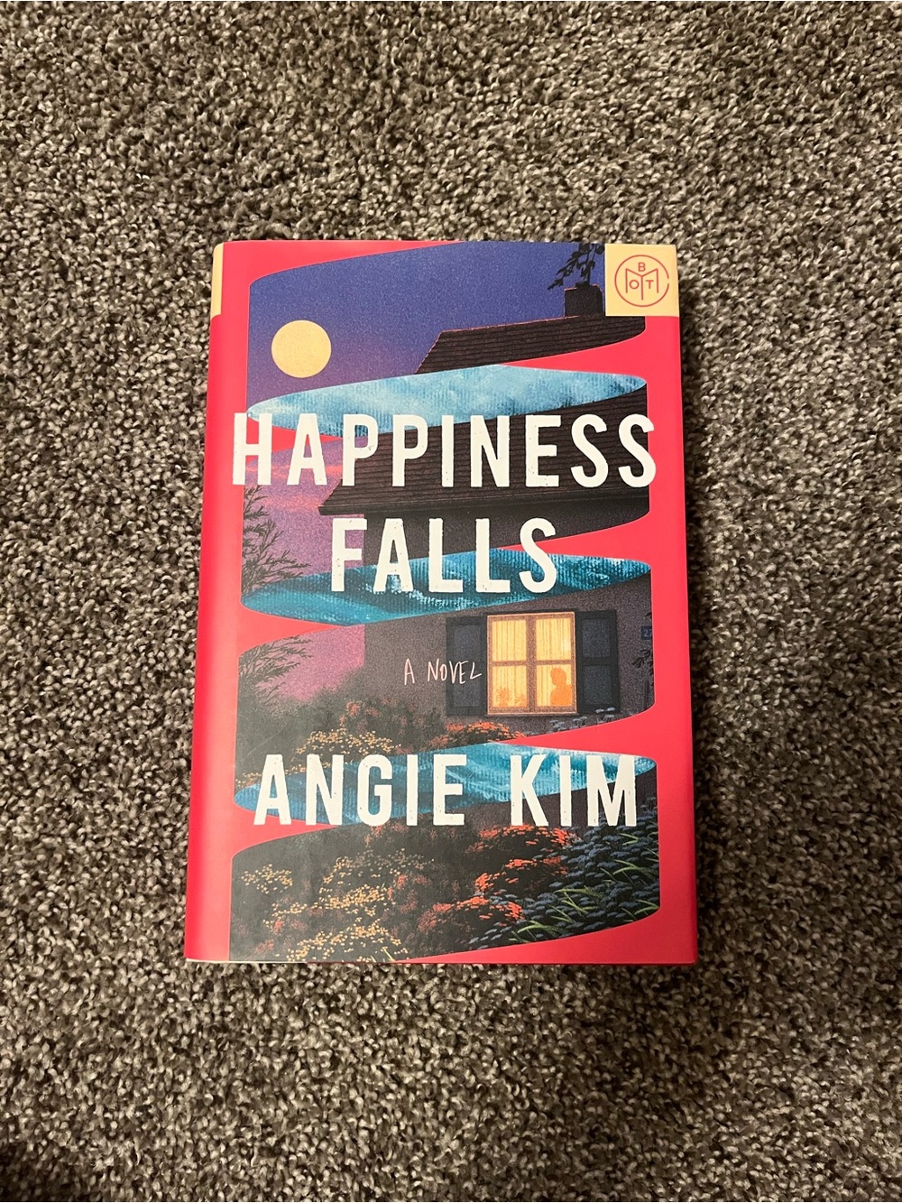 Angie Kim "Happiness Falls" Hardcover Book - Red Cover